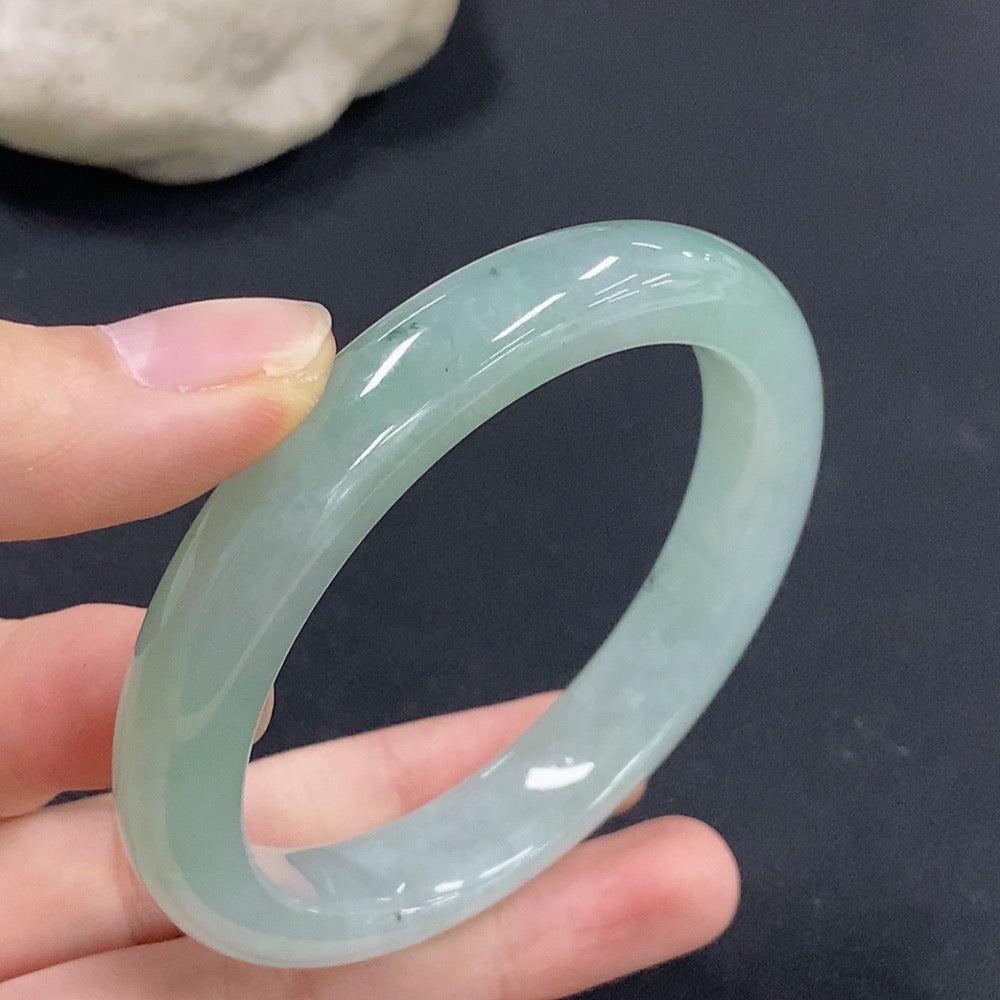 Jadeite round bracelet with size 55, weighing approximately 49.08g, from HKHQ, featuring smooth, polished jade beads.