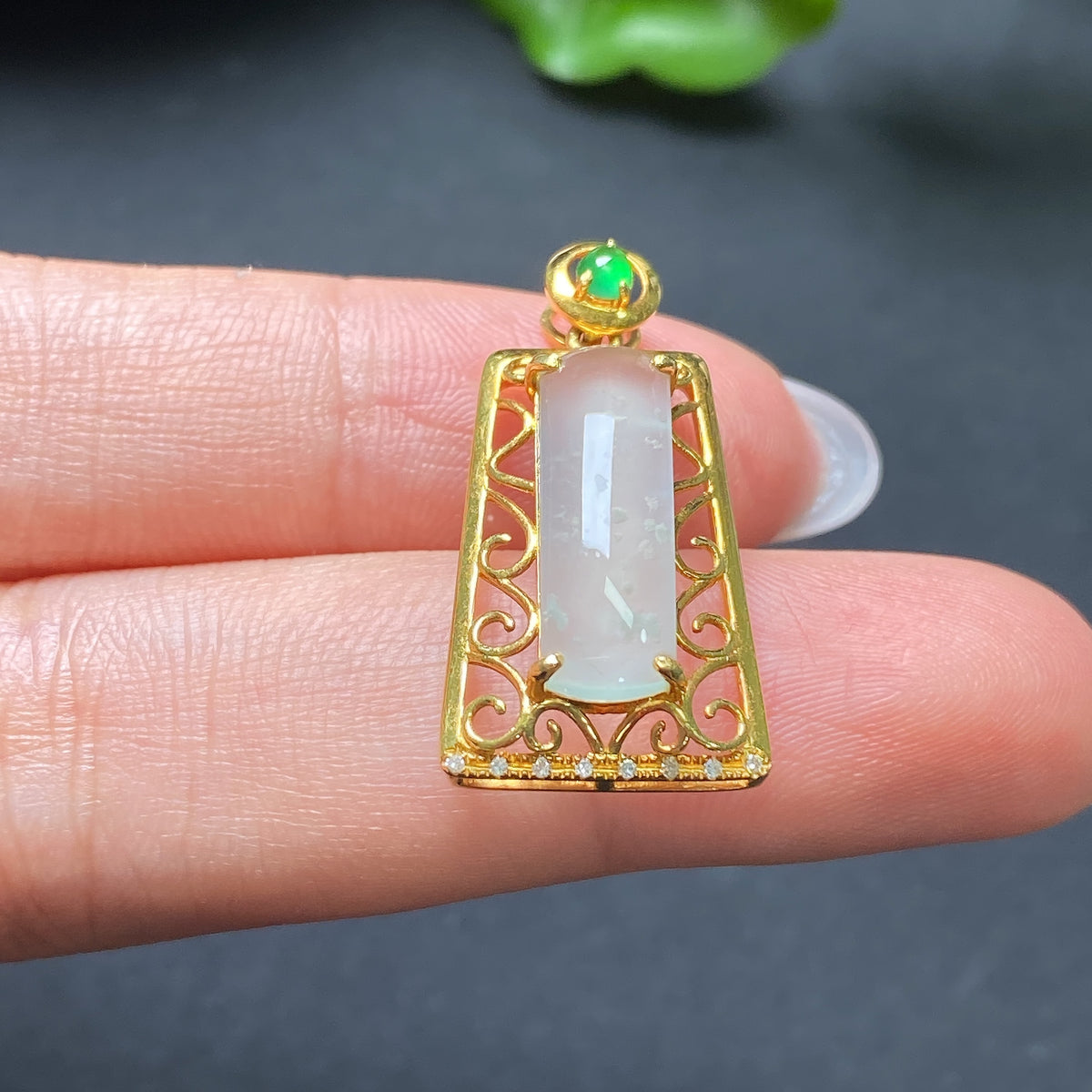 Jadeite inlaid pendant with diamond accents, 18k