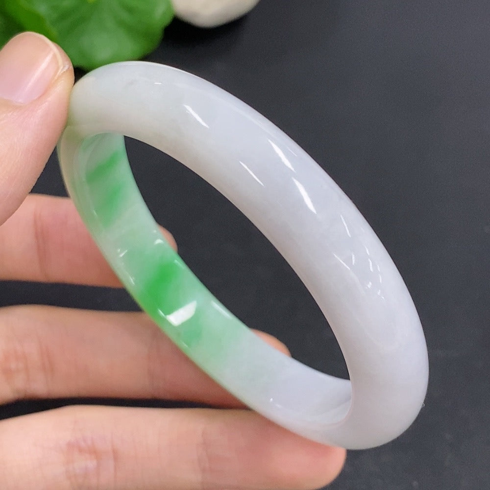 Jadeite round bracelet with other minerals, approximately 44g, size 55, crafted by HKHQ, shown on a neutral background.
