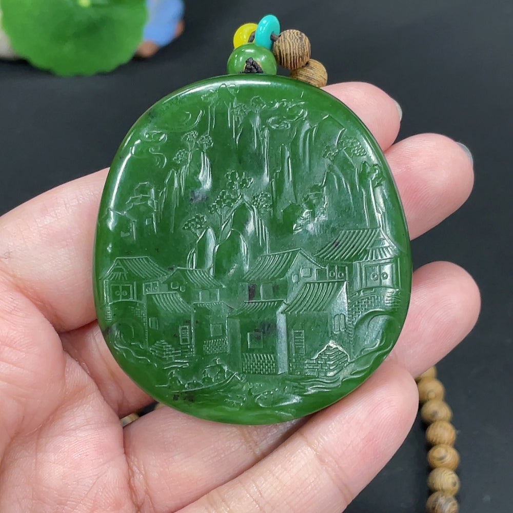 Hetian Jade Jasper pendant featuring Mahasthamaprapta Bodhisattva, crafted by HKHQ, showcasing intricate jade carving and spiritual symbolism.