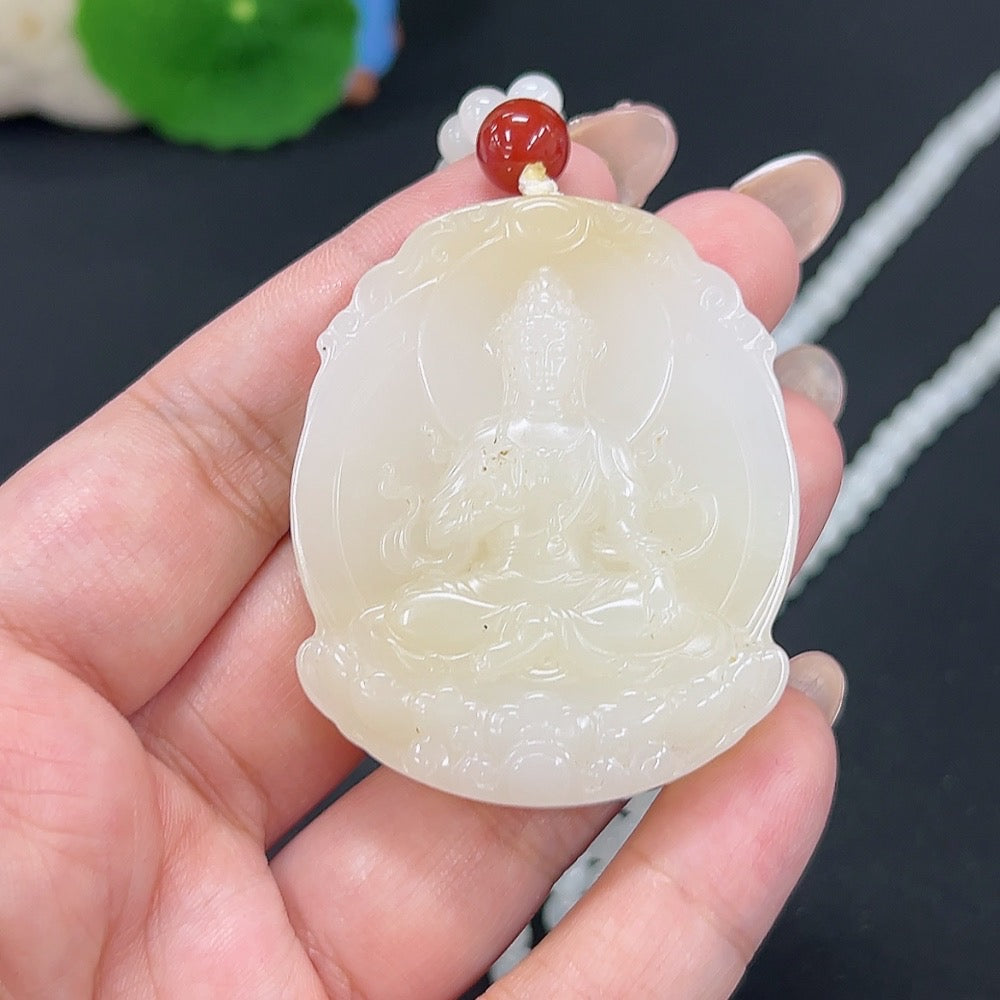 Hetian jade Guanyin pendant with rope, weighing approximately 76.1g, crafted by HKHQ, featuring intricate carved detailing.