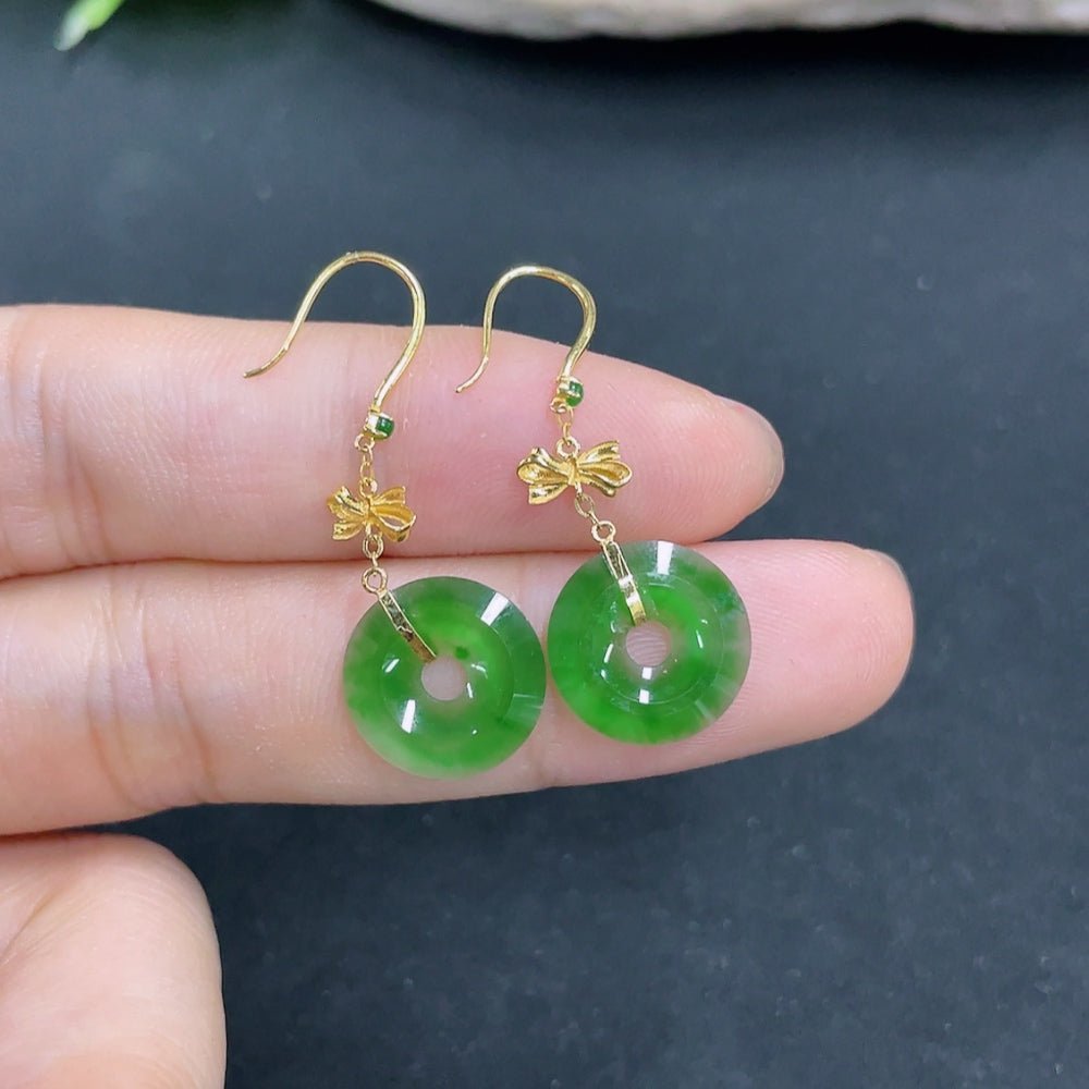 Elegant jadeite earrings from HKHQ with a total weight of 1.3 grams, showcasing smooth, polished green jade jewelry.