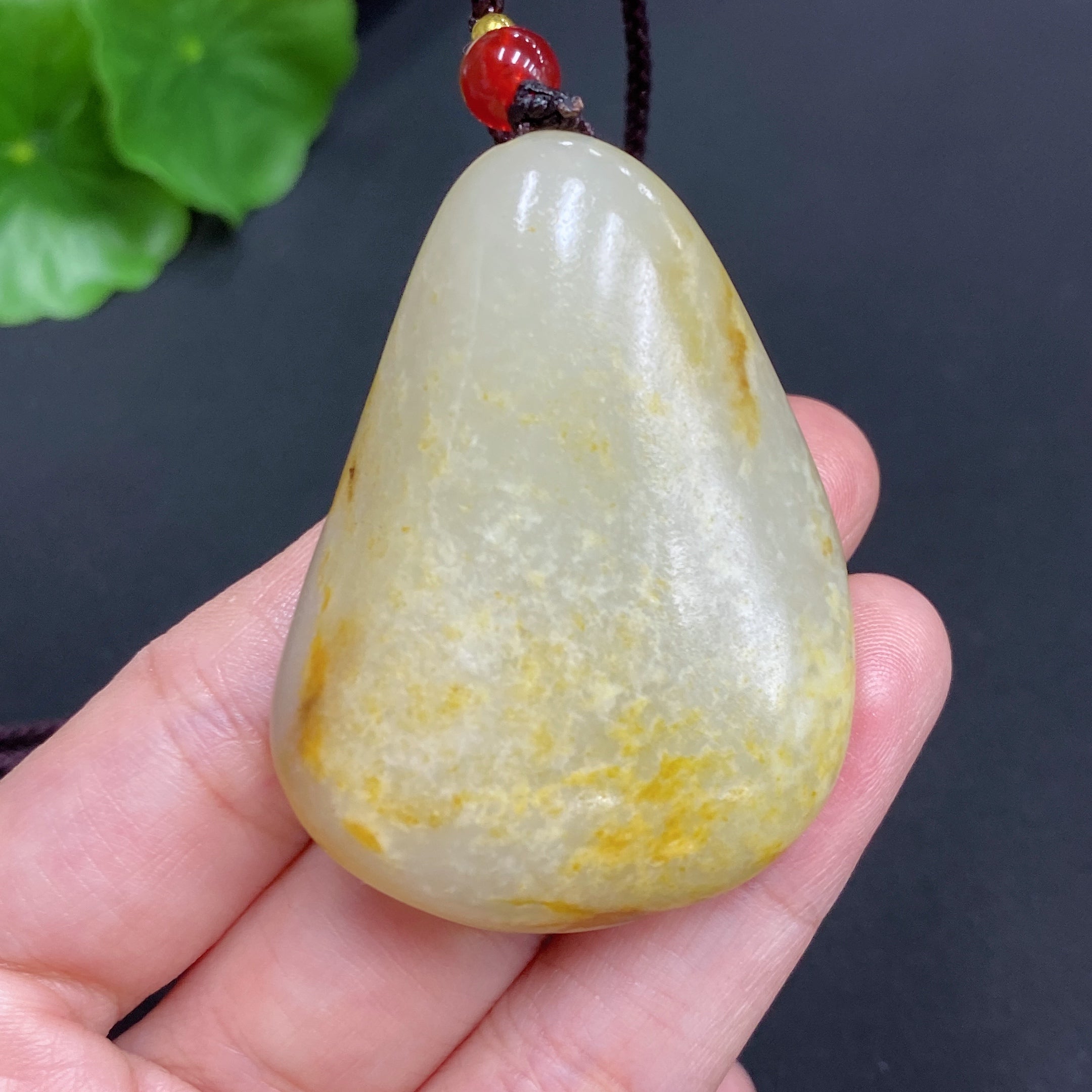 Hetian Jade Pendant    God of Wealth    Total Weight (including rope): 35.1g    Undetermined skin color cause