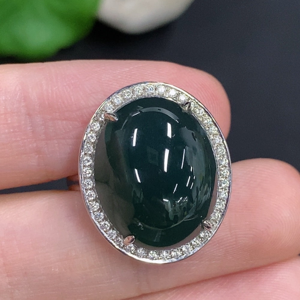 Jadeite cabochon ring with diamond accents, 18k gold band, size 14, HKHQ brand, showcasing the smooth jade gemstone.