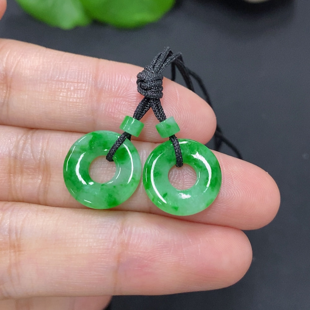 Set of jadeite donut pendants for necklaces, total weight 2.3g, featuring smooth green jadeite charms with polished finish.