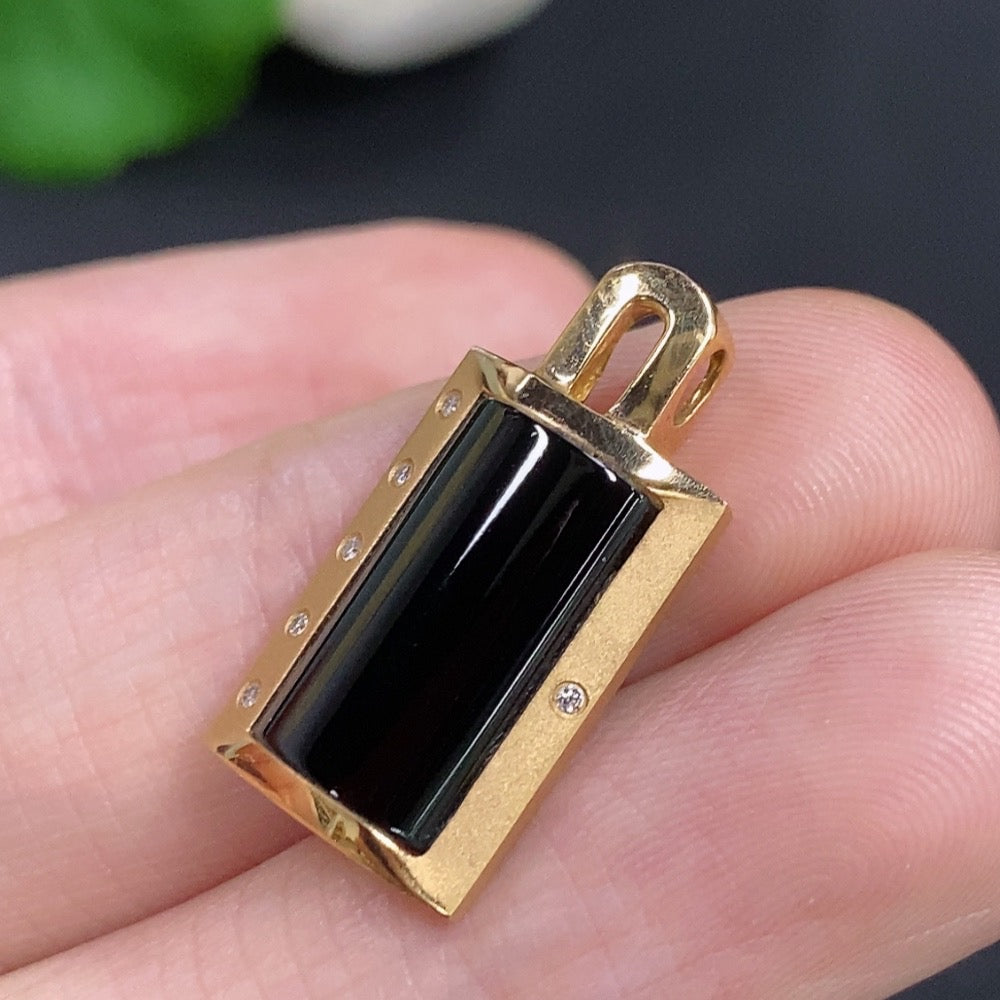 Jadeite inlaid pendant necklace with 18K gold and diamond accents, featuring intricate craftsmanship and elegant design.