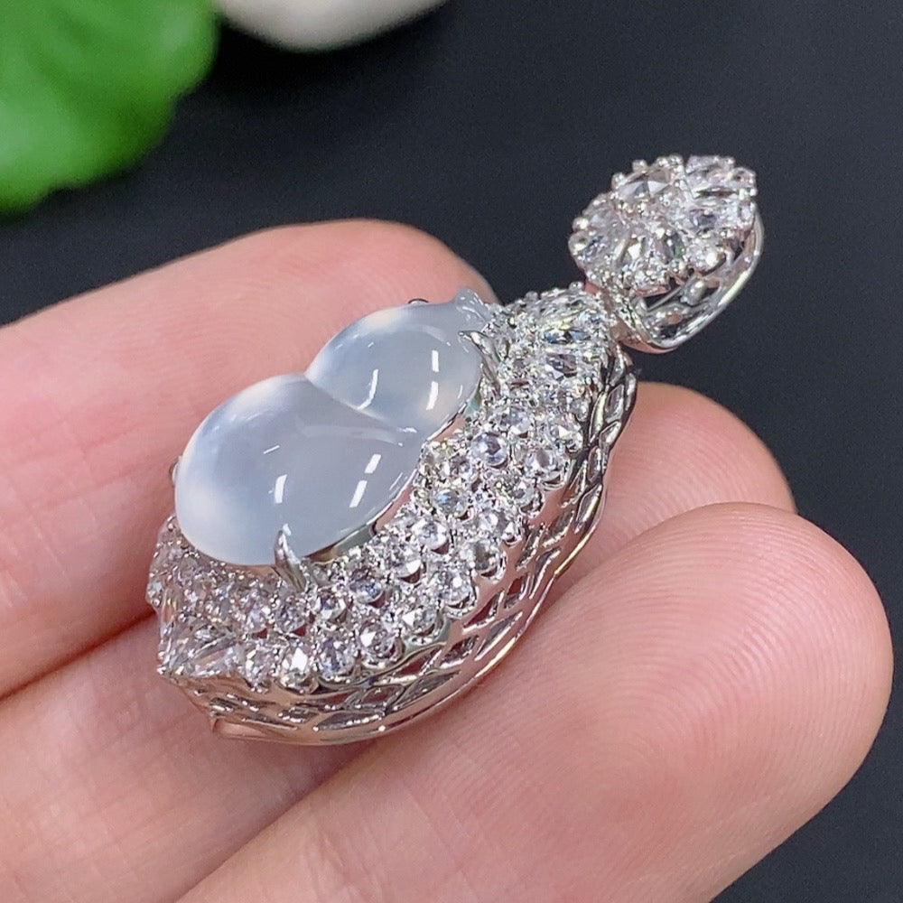 Jadeite gourd pendant with diamond accents, 18k gold necklace from HKHQ, showcasing intricate inlay design and polished finish.