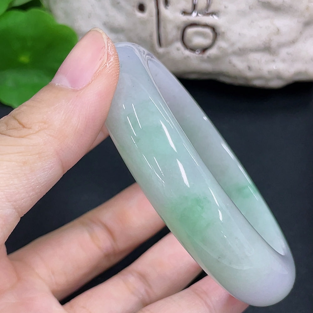 Jadeite round bangle with a 58mm size and 72g weight, crafted by HKHQ, showcasing smooth, polished jade surface.