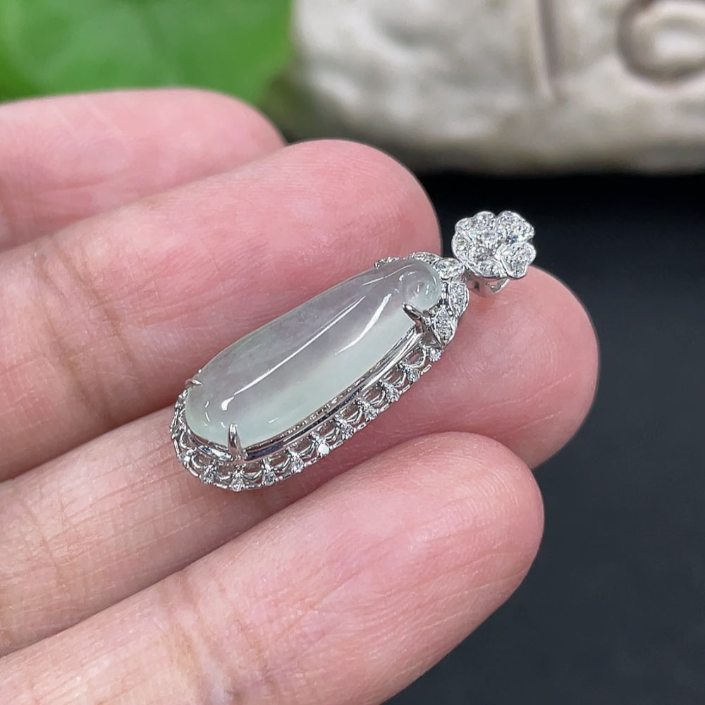 Jadeite blessing melon pendant in 18K gold with diamond accents, delicate and elegant jewelry piece from HKHQ.