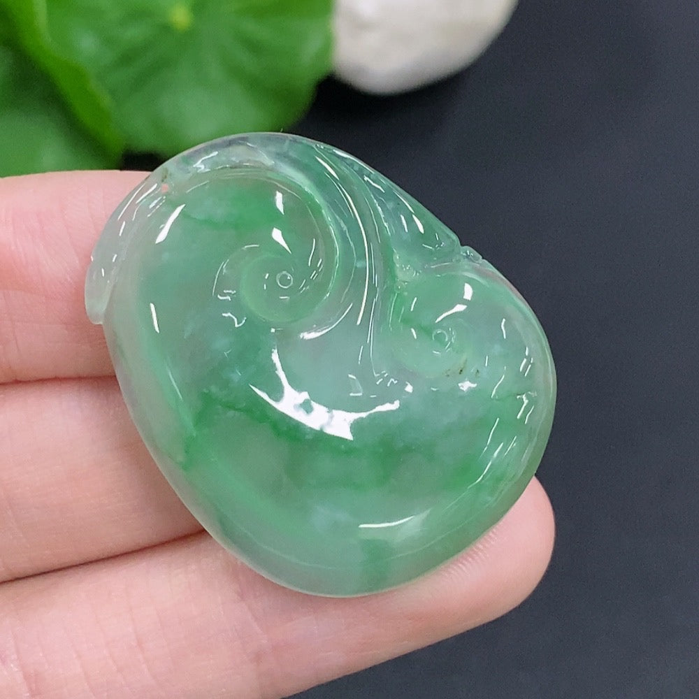 Jadeite Ruyi pendant with smooth polished surface, weighing approximately 10.5g, featuring a traditional design from HKHQ.