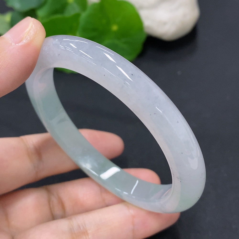 HKHQ jadeite round bangle, size 56.7, weighing approx. 44g, showcasing smooth, polished green jade with a glossy finish.