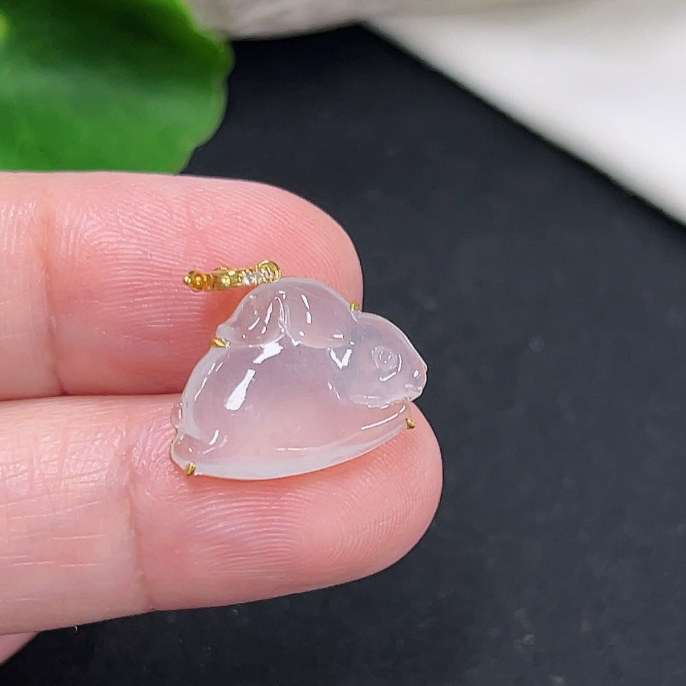 Jadeite bunny pendant with 18K gold and diamond inlay, HKHQ, featuring detailed jade craftsmanship and gold accents.
