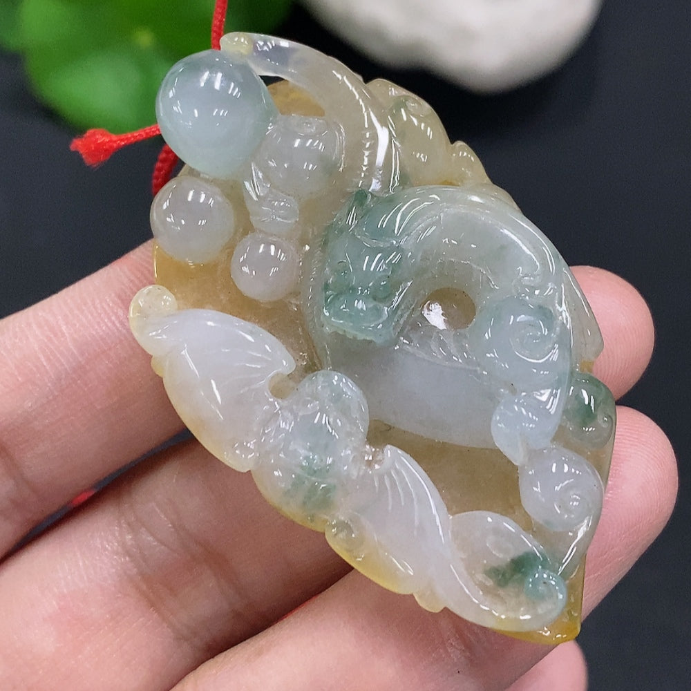 Jadeite pendant with cord, total weight approximately 25.2g (color origin undetermined)