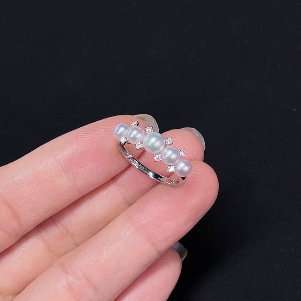 Seawater pearl ring with 18K gold by HKHQ featuring a 3.9-4.7mm pearl, accented with diamonds, size 13, total weight 2.29g