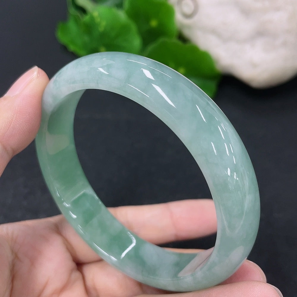 HKHQ jadeite round bangle in size 56.8mm, featuring smooth jade surface and weighing approximately 50.5g.