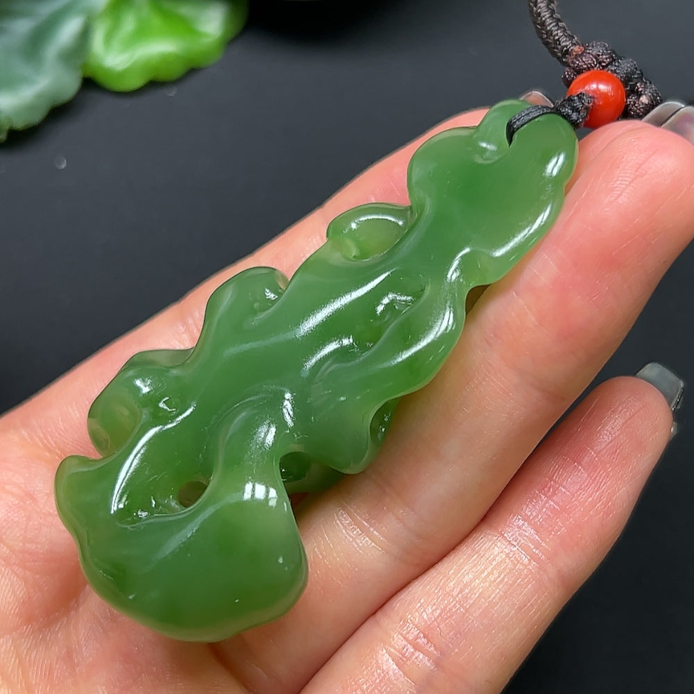Hetian Jade coral stone pendant necklace with rope, weight 48.17g, from HKHQ, featuring a polished jade and coral pendant.