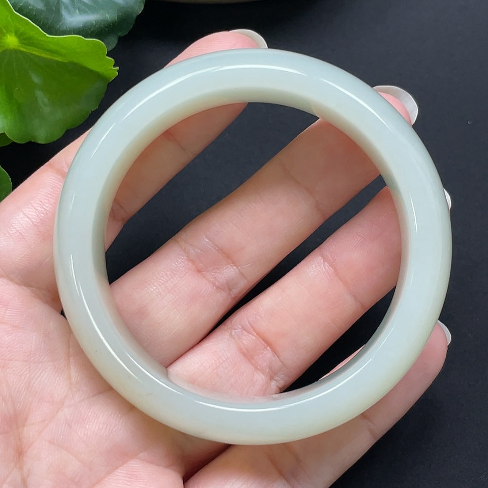 HKHQ Hetian Jade round bracelet, 52mm diameter, weighs approx. 60.95g, showcasing smooth, polished green jade beads.
