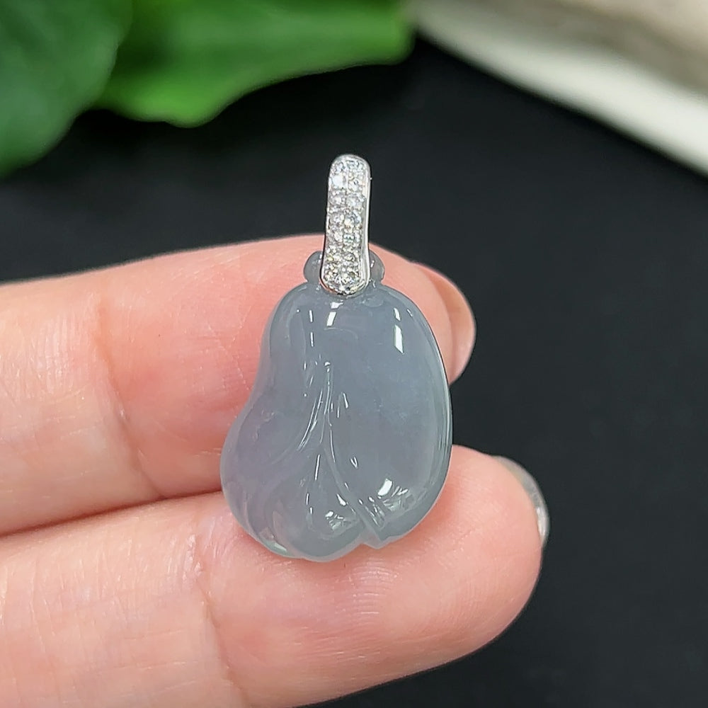 Jadeite pendant with diamond accents on 18K gold chain, HKHQ jewelry, showcasing intricate craftsmanship and luxurious design.