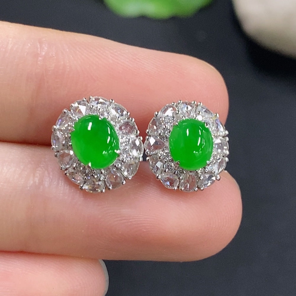 Jadeite earrings with 18k gold and diamond accents, showcasing smooth green jade and sparkling gemstones, crafted by HKHQ.