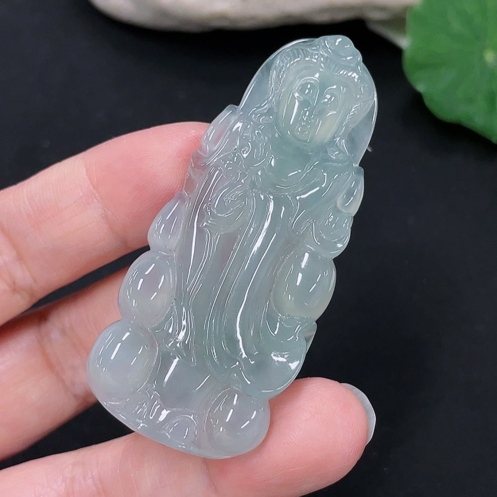 Jadeite Guanyin pendant with intricate carvings, weighing approximately 20.1 grams, made of green jade by HKHQ.