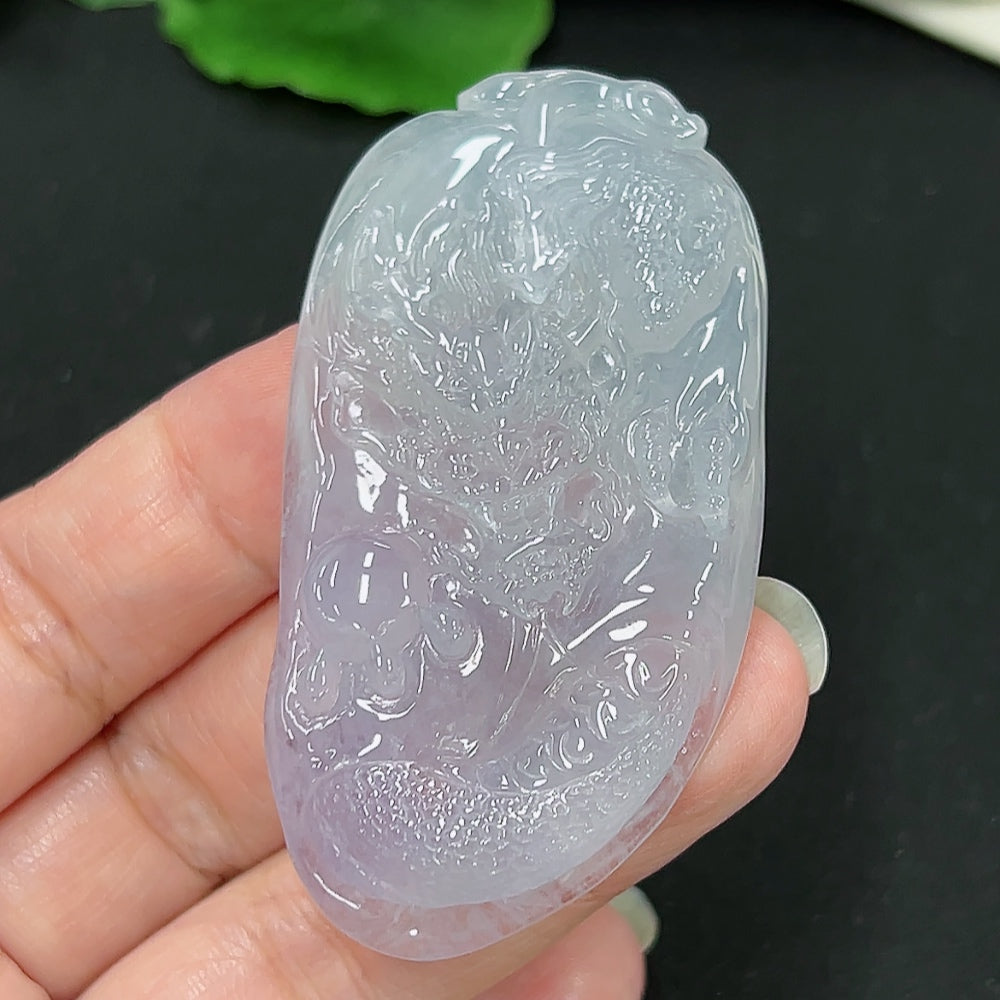 Jadeite dragon pendant from HKHQ featuring detailed carving, weighs approximately 34g, showcasing vibrant green jade craftsmanship.
