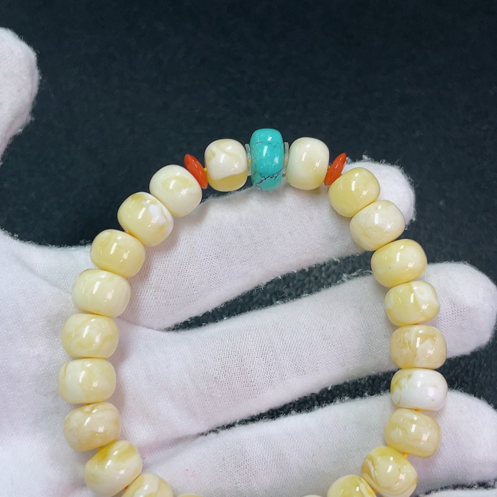Amber Beeswax Bracelet with Hetian Jade (stone setting may be non-natural), total weight approx. 16.52g, size about 10mm