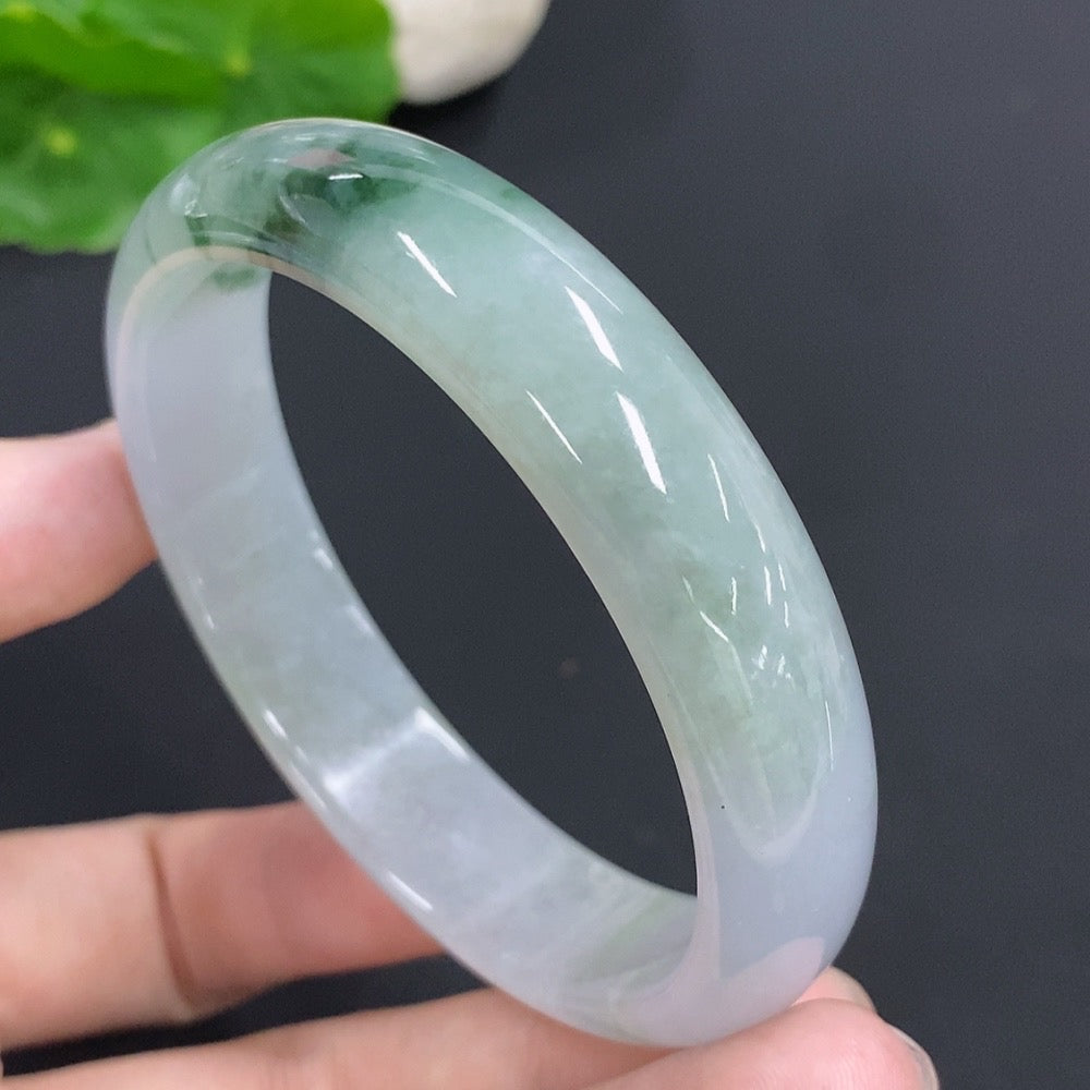 HKHQ jadeite round bangle, 58mm size, approximately 48.4g weight, smooth green jade jewelry in close-up image