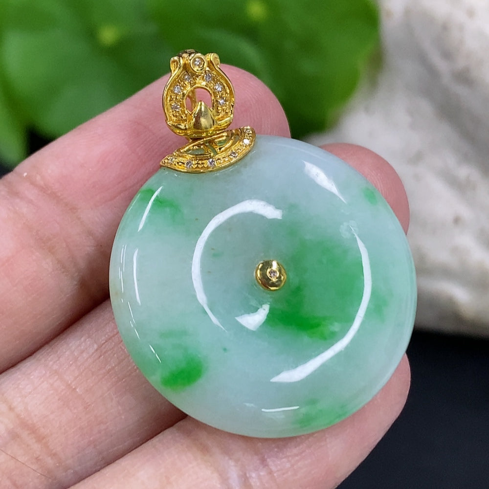 Jadeite peace knot pendant with 18K gold clasp and diamond accents, HKHQ jade jewelry, showcasing intricate design and craftsmanship.