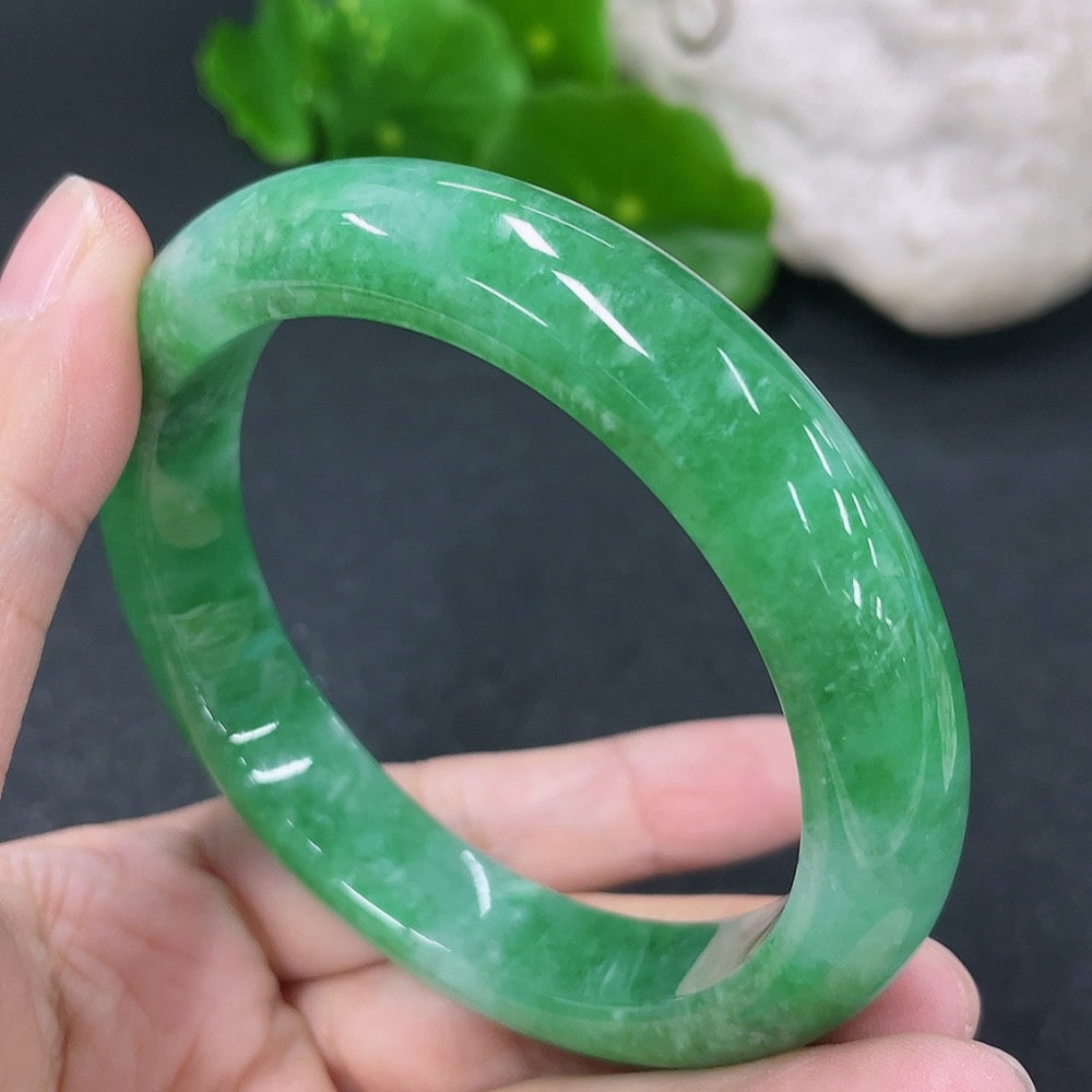 Jadeite round bangle in size 56.5mm with a total weight of 56.9g, featuring smooth, polished jadeite surface, by HKHQ.