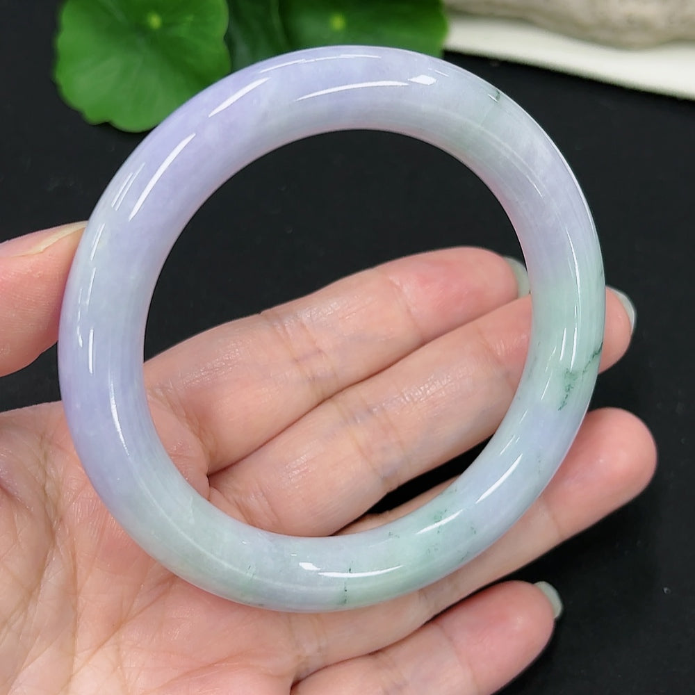 Jadeite round bangle with a weight of 58.79g and size 56.4, crafted from smooth green jade by HKHQ.