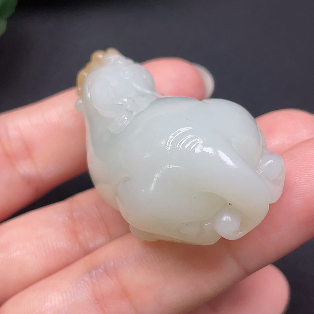 Hetian Jade Pixiu pendant from HKHQ, featuring a detailed carved jade design, weighs approximately 73.49 grams.