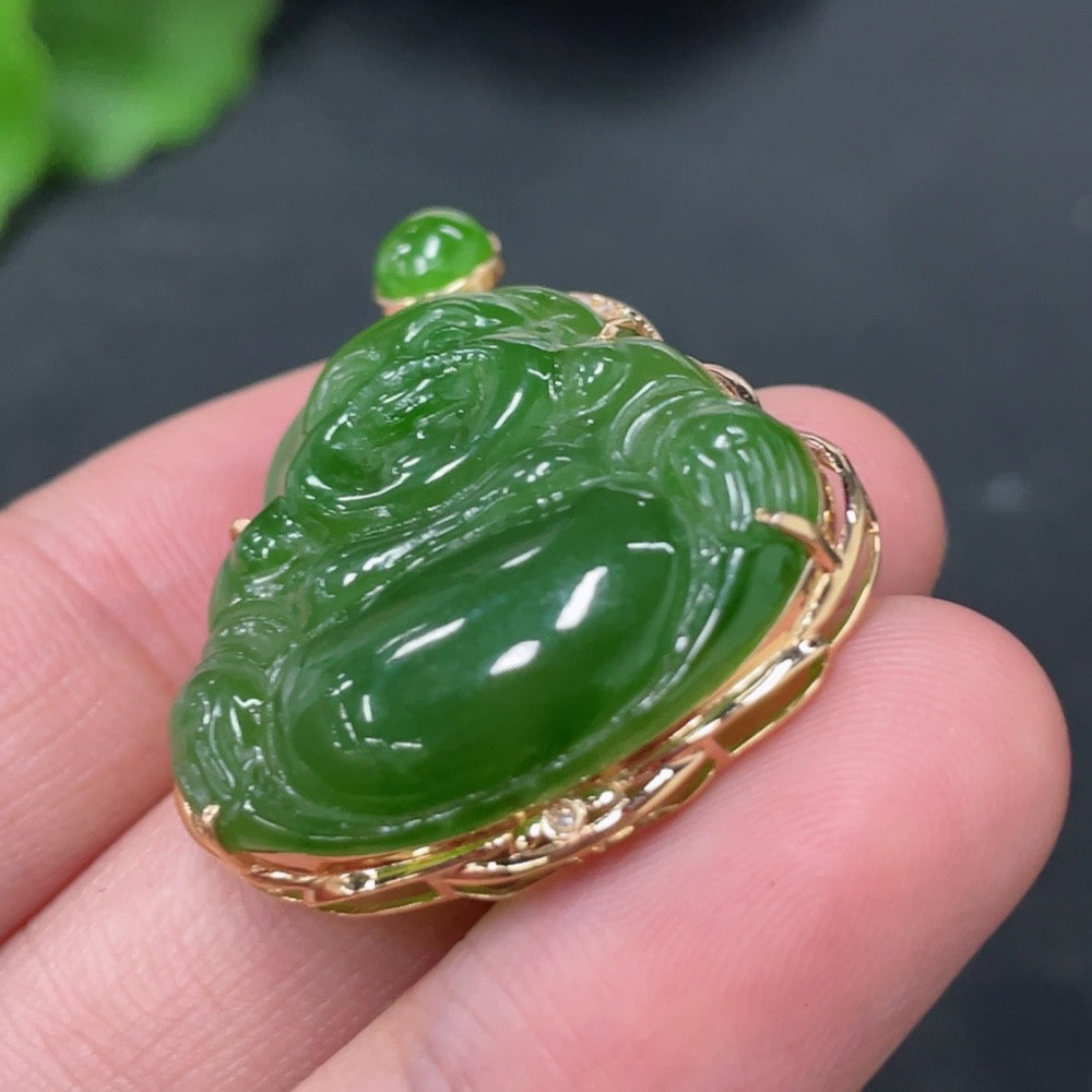 Hetian Jade Buddha pendant in 18K gold with diamond accents, featuring a detailed jade carving, weighs approximately 6.2 grams.