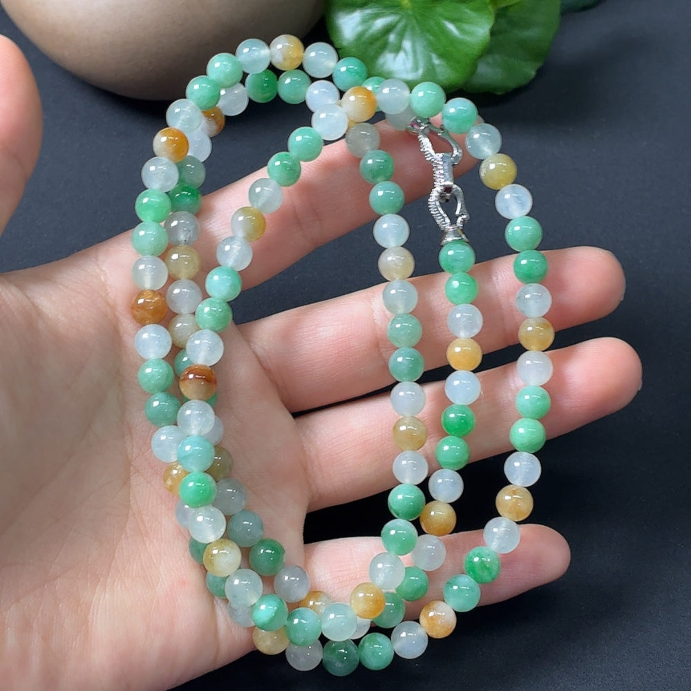 Jadeite bead strand with 5.9mm non-gold card, featuring smooth green jade beads, total weight approximately 42.38g.
