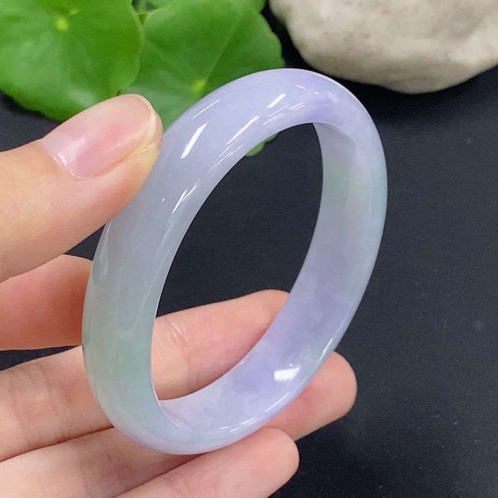 HKHQ Jadeite oval bangle in size 50.2 with a weight of 33.7g, showcasing smooth, polished jadeite craftsmanship.