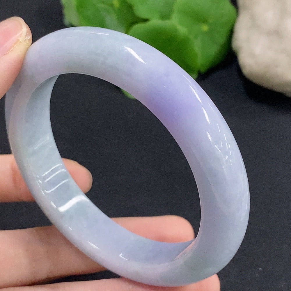 Jadeite round bracelet with size 58, weighing approximately 71.29g, featuring smooth, polished jade beads in natural green tones.