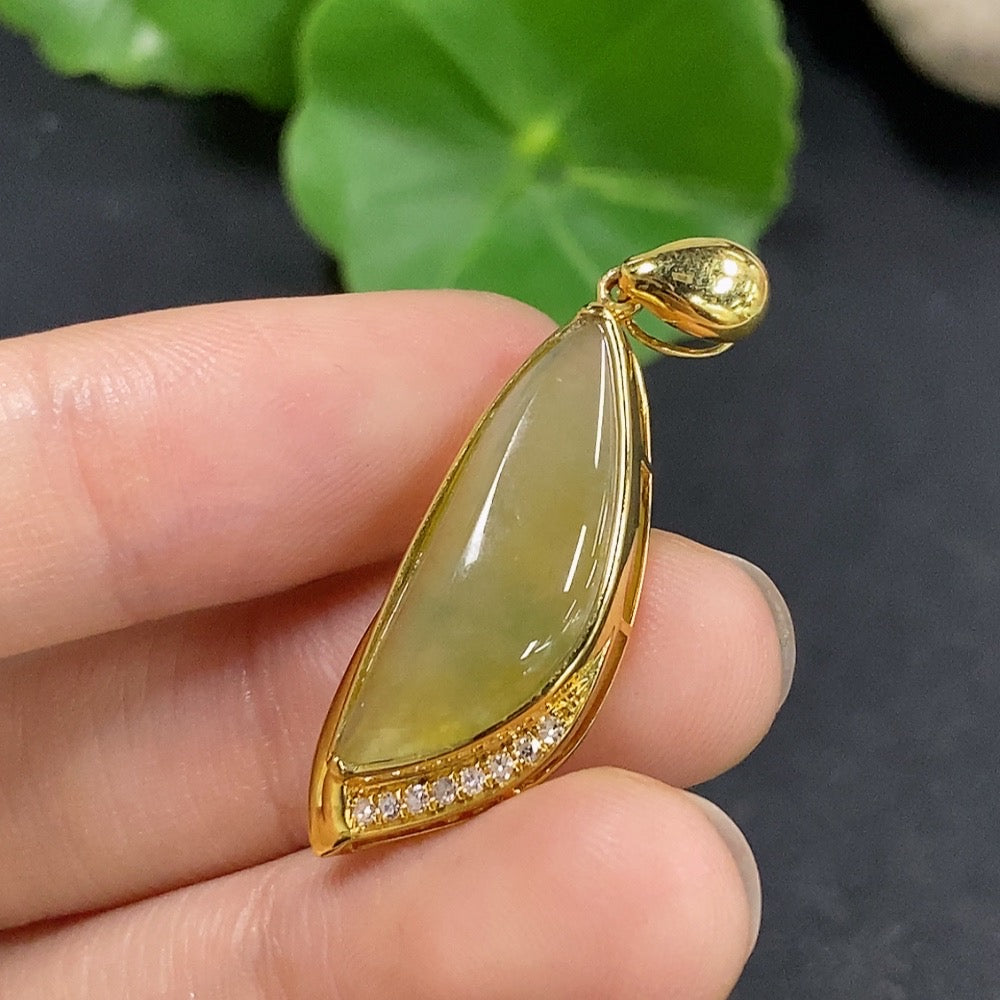 Jadeite pendant with 18K gold setting and diamond accents, showcasing a polished green jade stone, 3.5g weight, by HKHQ.