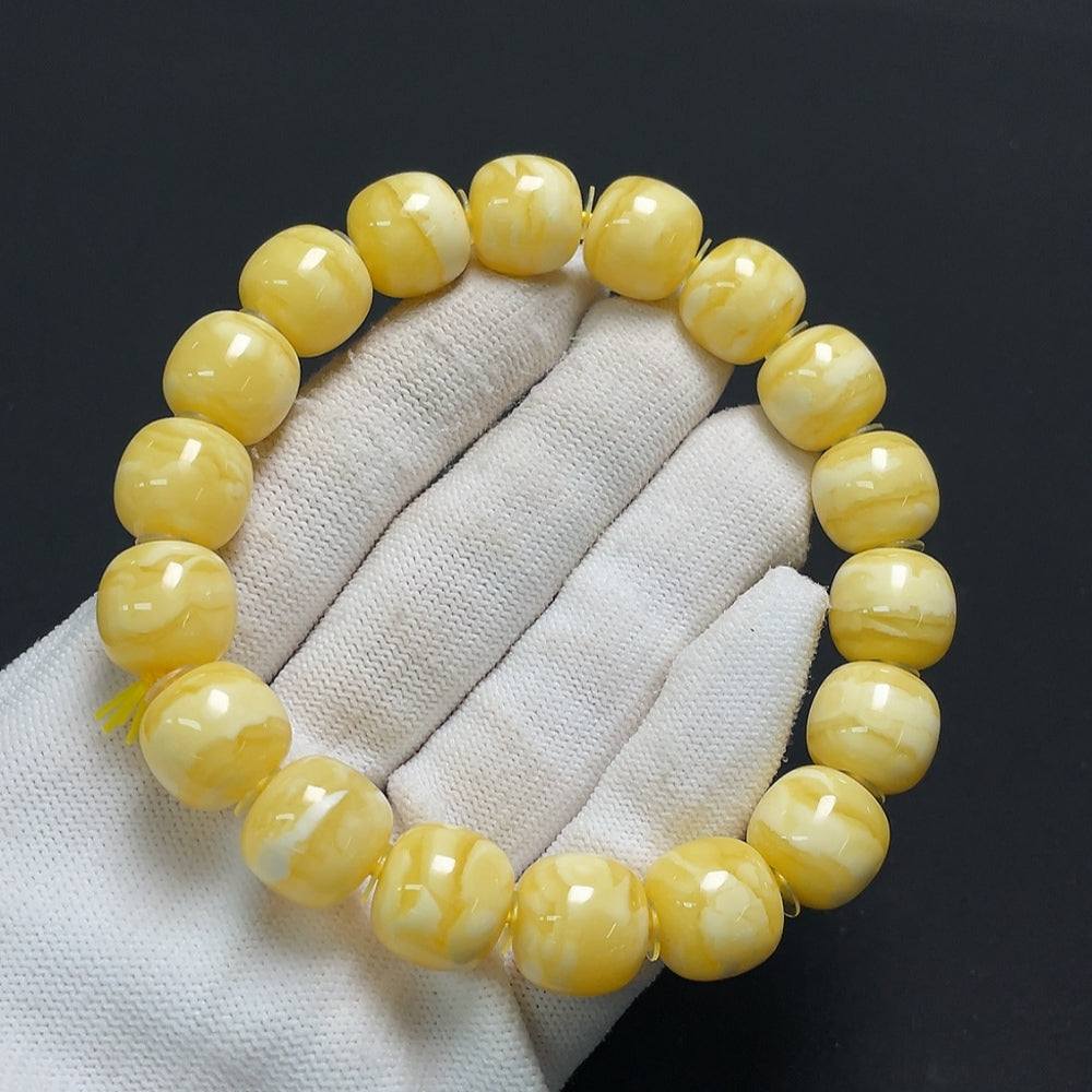 Amber Beeswax Bracelet by HKHQ, 24.6g, featuring warm amber beads woven into a stylish bracelet design.