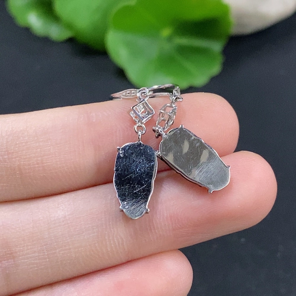 Jadeite leaf inlaid earrings by HKHQ featuring 18k gold and diamond accents, with a total weight of approximately 1.73 grams.