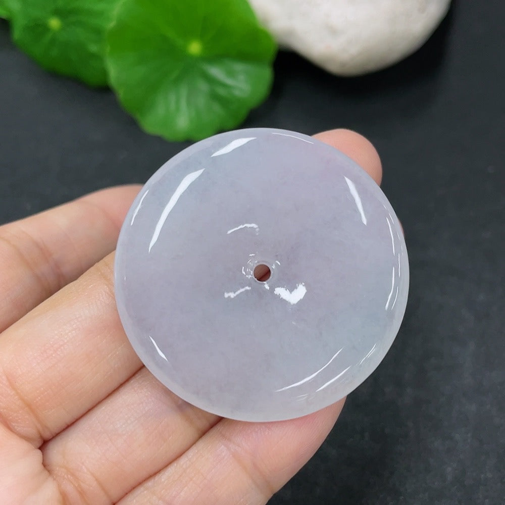 Jadeite pendant featuring a peace knot design, crafted from high-quality jade, weighing approximately 18 grams, by HKHQ.