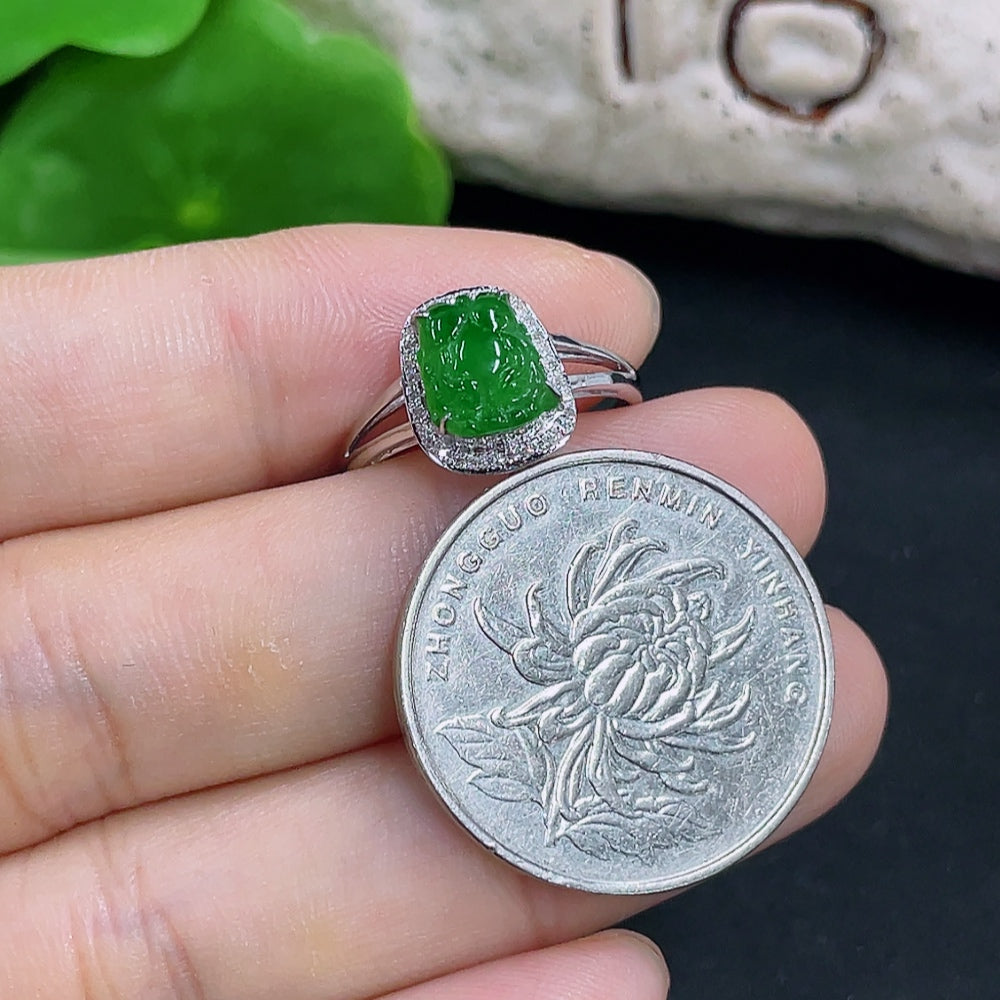 Jadeite ring with 18k gold band and diamond accent, size 13, weighing approximately 1.76g, showcasing a polished jade gemstone.