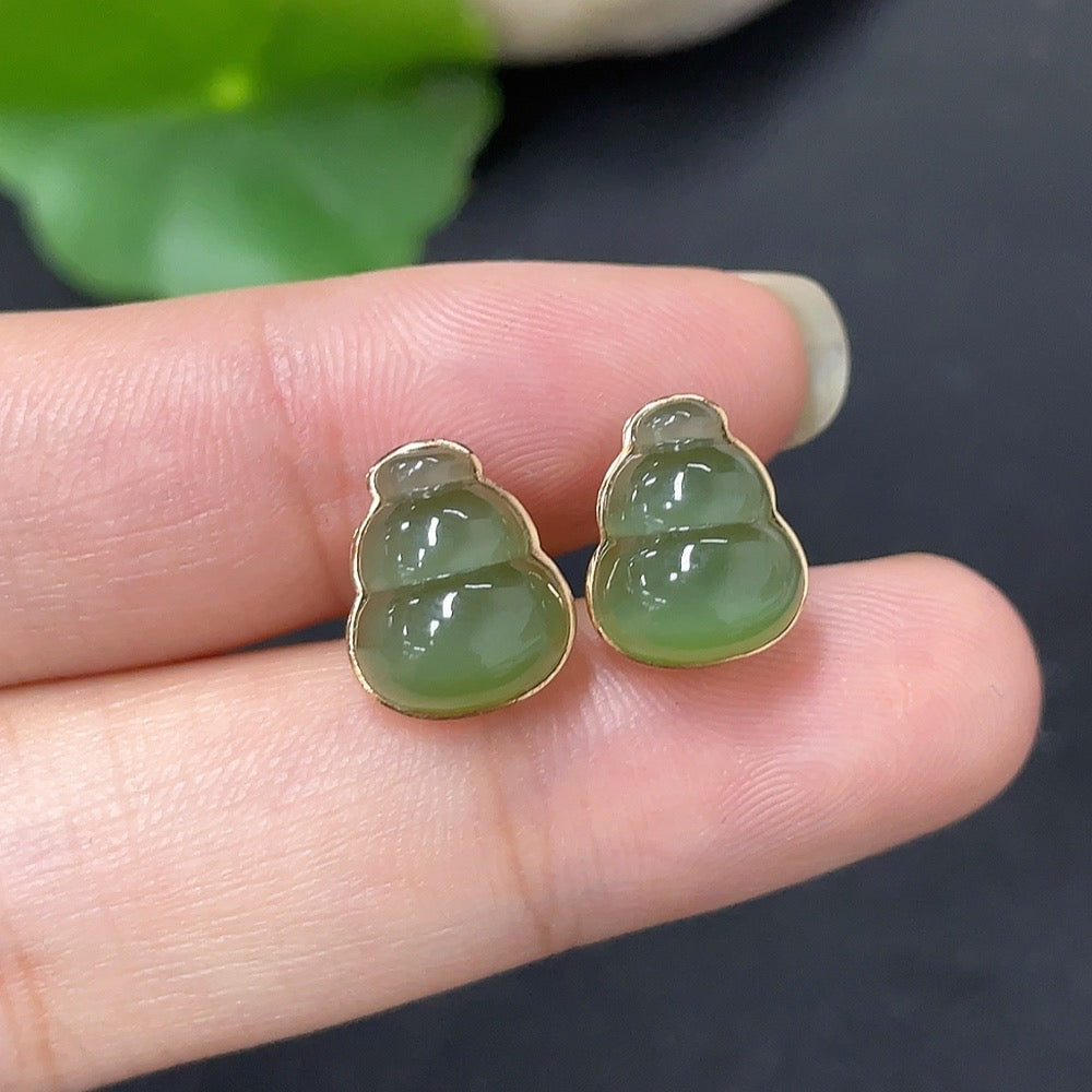HKHQ Hetian Jade inlaid earrings with 18k gold, showcasing elegant jade stones and gold detailing, total weight 2.2g.