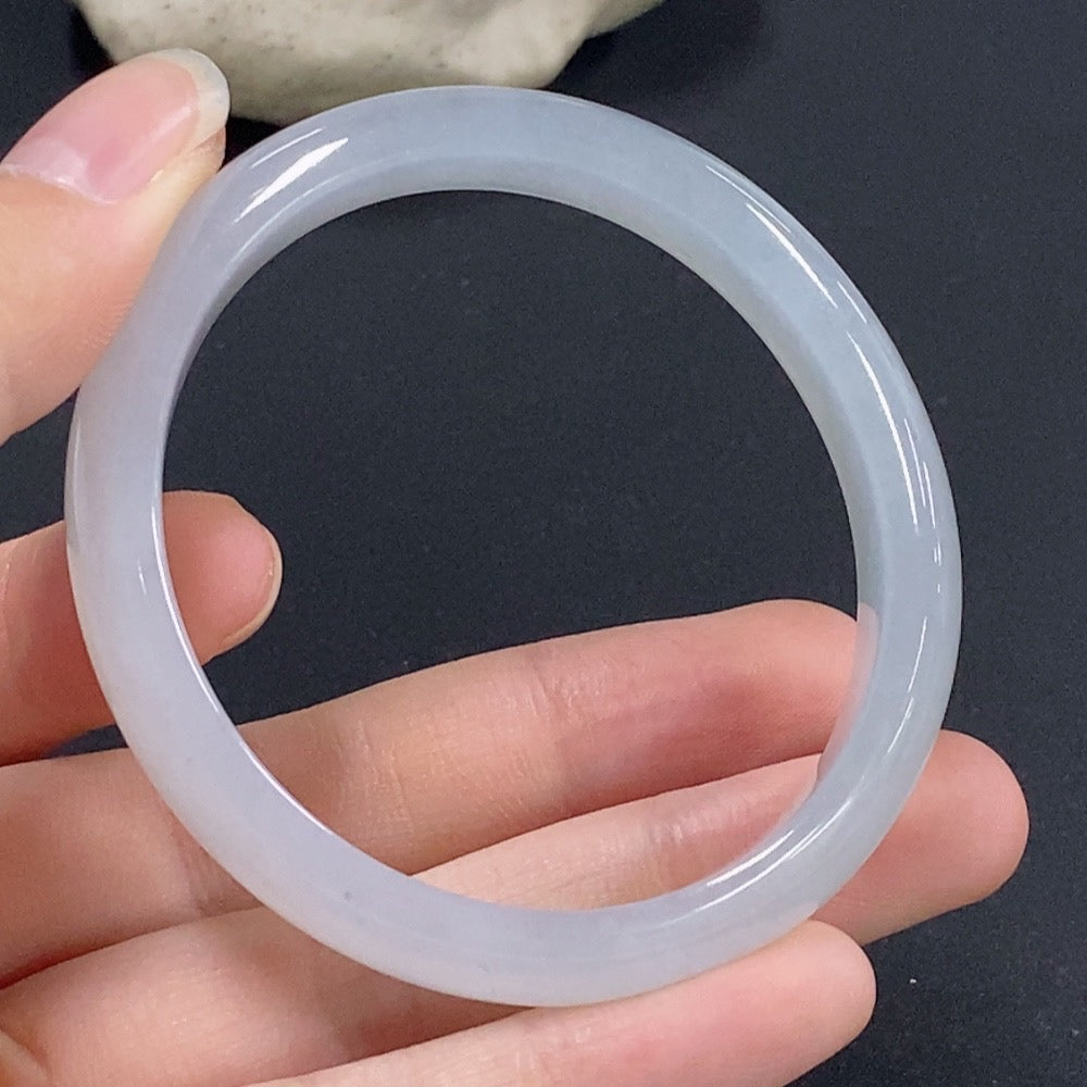 HKHQ jadeite oval bangle in size 51.6 with 31.71g, showcasing smooth, polished green jadeite bracelet with oval shape.