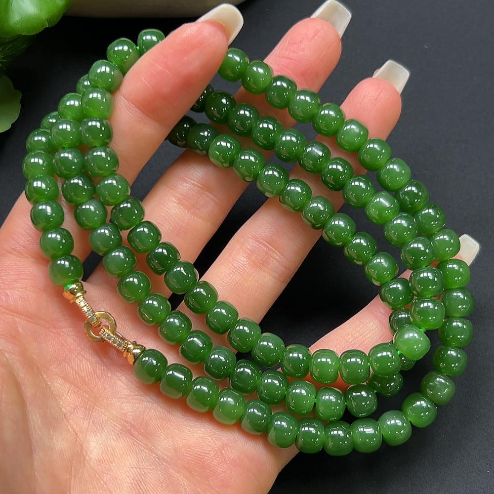 HKHQ Hetian Jade bead necklace with 7.2mm non-gold beads, showcasing smooth, polished green jade stones on a simple string.