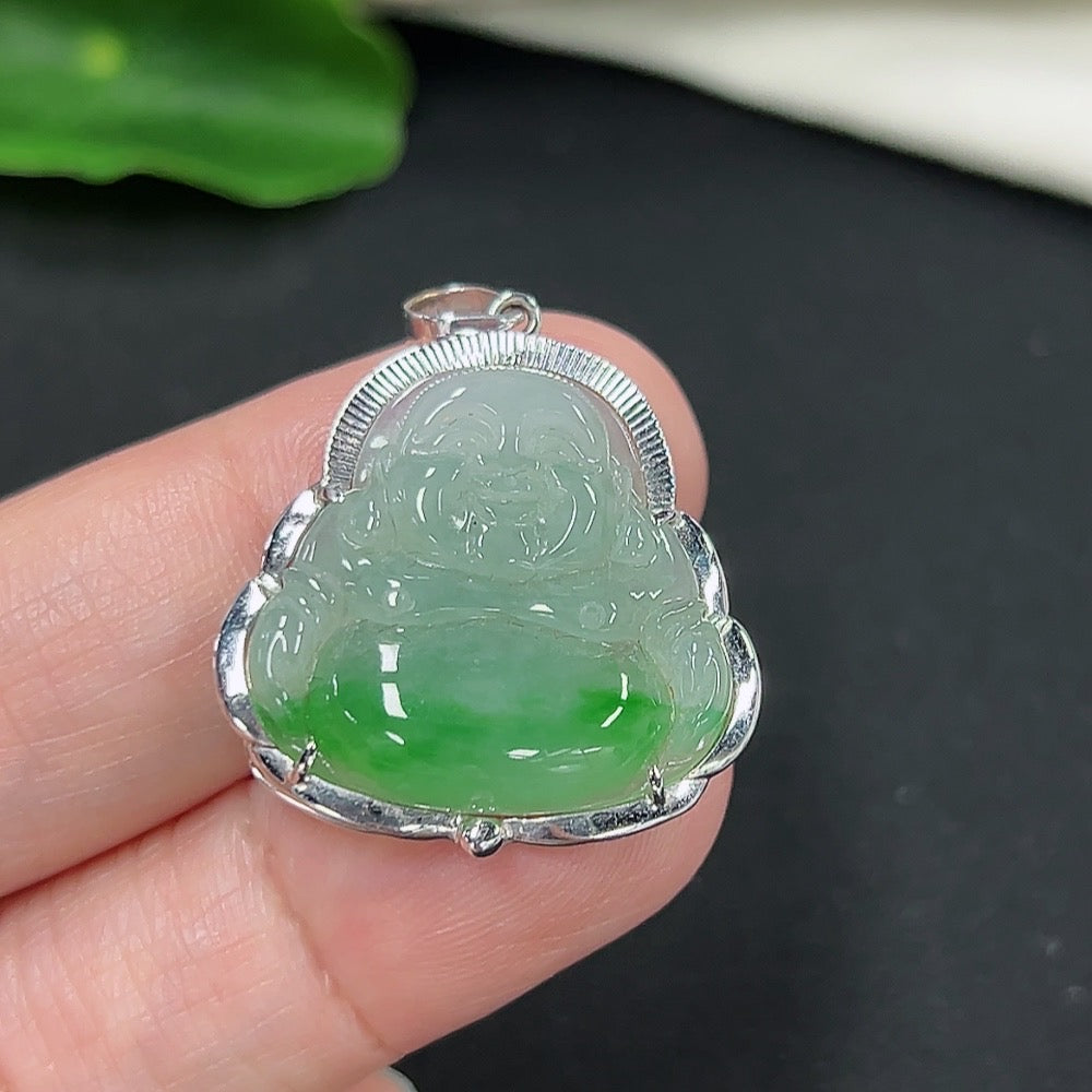 Jadeite Buddha pendant with 18k gold setting, hanging on a delicate necklace, showcasing craftsmanship and elegant design.