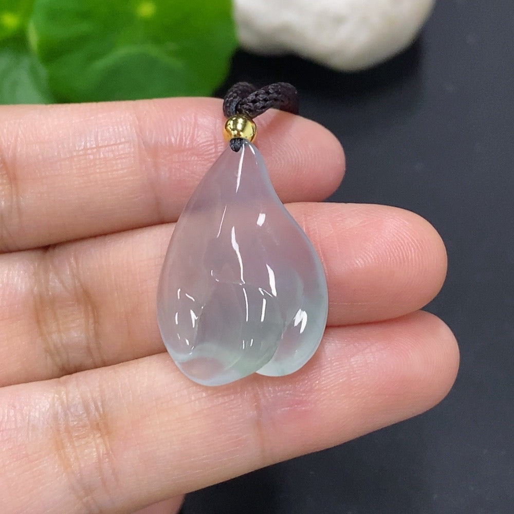 Jadeite freeform pendant with natural green jade, handcrafted by HKHQ, weighing approximately 7.2g with rope included.