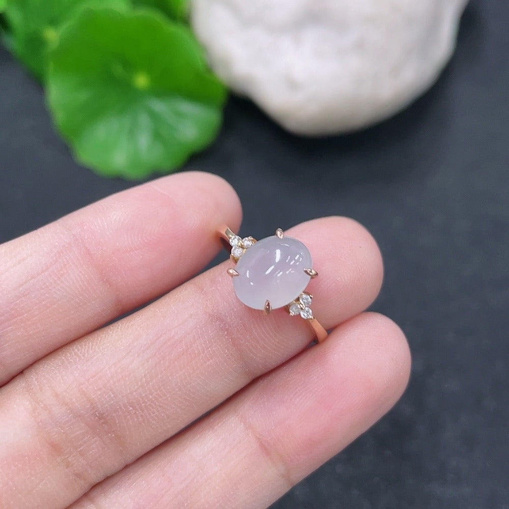Jadeite and diamond ring in 14k gold with size 12, featuring a polished jade gemstone and sparkling diamonds, weight approx. 1.91g.