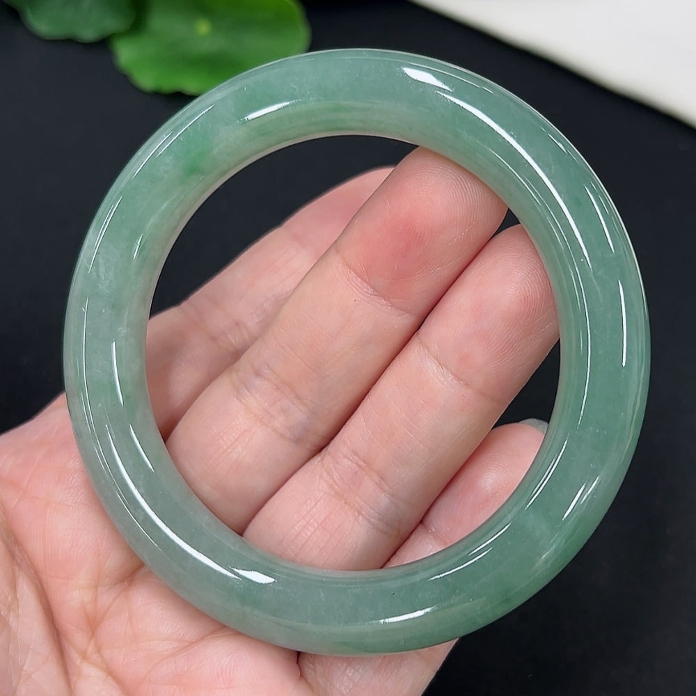 HKHQ jadeite round bangle size 54.3, crafted from high-quality jade, weighing approximately 58.4 grams.