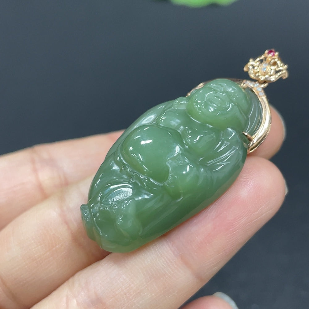 Hetian jade Buddha pendant with 18K gold inlay, accented with diamonds, weighing approximately 13.7g, from HKHQ.
