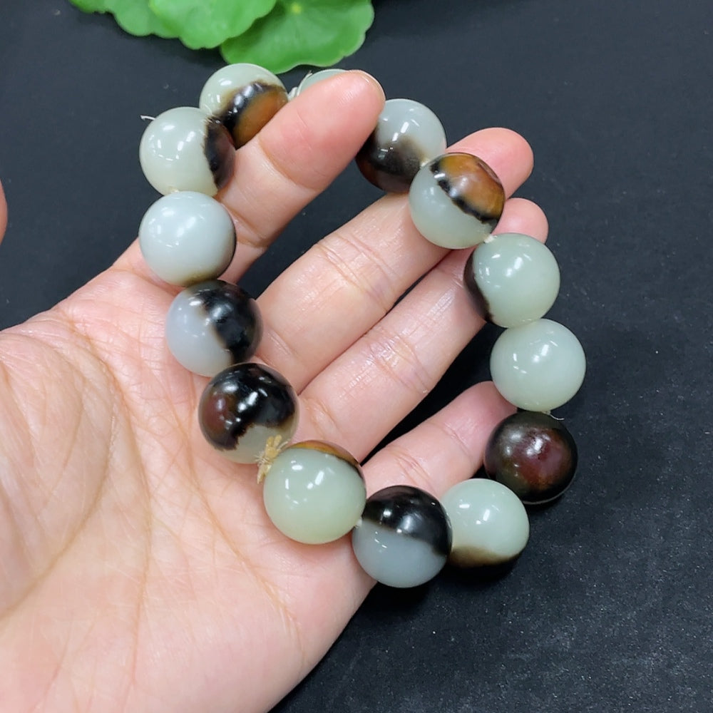 HKHQ Hetian jade bracelet with 15.5mm beads, approximately 83g, showcasing smooth green jade stones.