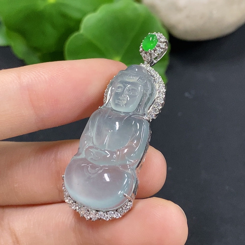 Jadeite Guanyin pendant set in 18K gold with diamond accents, featuring a detailed carved jade figure and elegant jewelry design